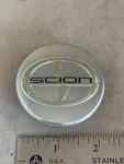 2002-11 Scion Tc Silver Wheel Center Cover Oem 42603-21040 2-1/4". Fixed Price $10.50.