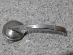1957 Chevy Interior Door Handle--gm #4151872--NOS. Fixed Price $19.95.