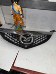2007 2008 2009 Mazda 3 Front Upper Grille Insert Aftermarket R7299 Dg. Fixed Price $69.99.